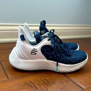 Navy blue Under Armor basketball shoes